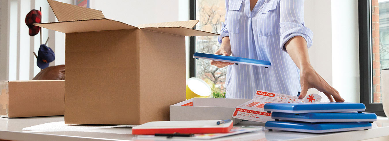 Moving boxes and supplies Open boxes on a desk